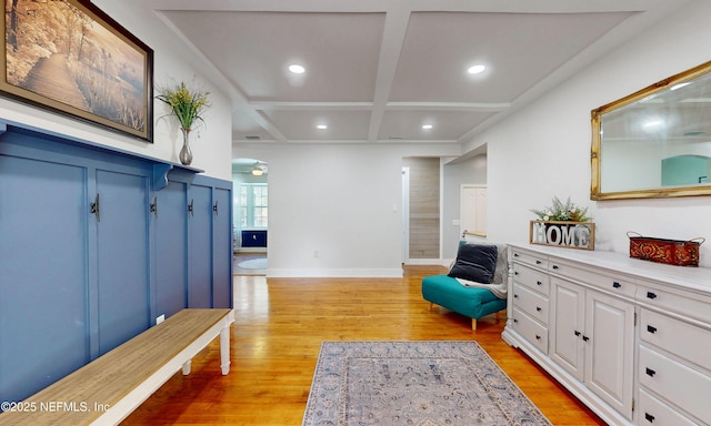 90 SE Forest St, Keystone Heights, FL 32656 - sitting room featuring light wood-style flooring, arched walkways, coffered ceiling, recessed lighting, and beam ceiling