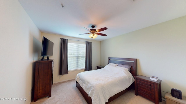 13810 Sutton Park Dr N Unit 528, Jacksonville, FL 32224 - bedroom with light colored carpet and a ceiling fan