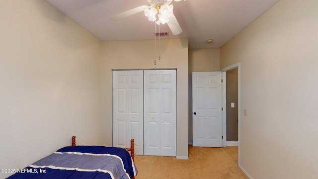13810 Sutton Park Dr N Unit 528, Jacksonville, FL 32224 - bedroom featuring light carpet, a closet, and ceiling fan