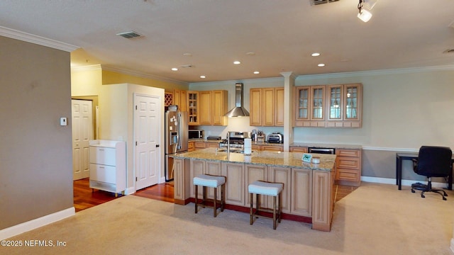 13810 Sutton Park Dr N Unit 528, Jacksonville, FL 32224 - kitchen with wall chimney exhaust hood, appliances with stainless steel finishes, crown molding, light carpet, and a kitchen island with sink