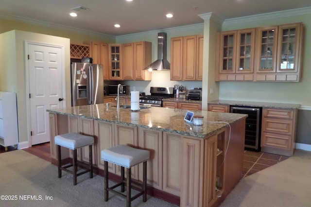 13810 Sutton Park Dr N Unit 528, Jacksonville, FL 32224 - kitchen with wall chimney exhaust hood, appliances with stainless steel finishes, wine cooler, a center island with sink, and a breakfast bar