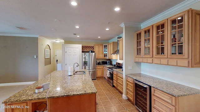 13810 Sutton Park Dr N Unit 528, Jacksonville, FL 32224 - kitchen with stainless steel appliances, wine cooler, an island with sink, recessed lighting, and ornamental molding
