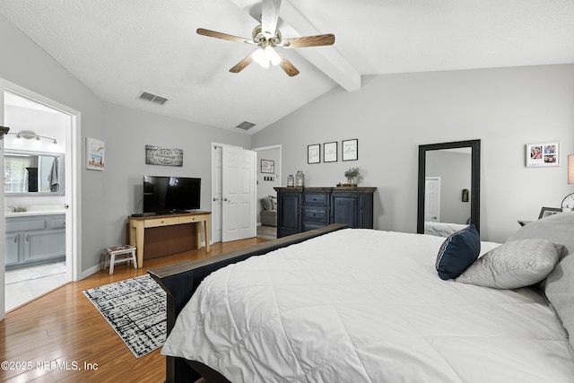 3172 Twilight Ct, Middleburg, FL 32068 - bedroom featuring light wood-style floors, ensuite bathroom, and a ceiling fan