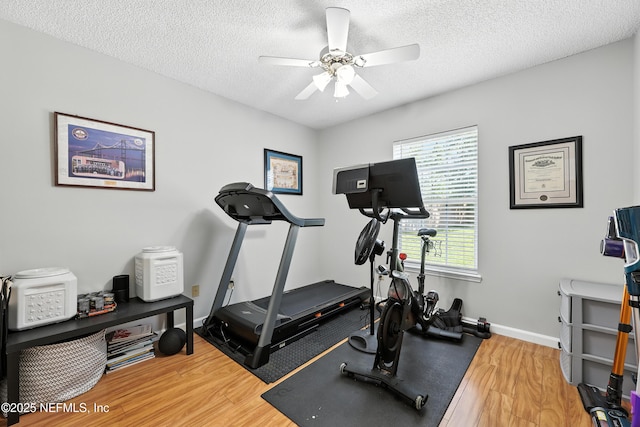 3172 Twilight Ct, Middleburg, FL 32068 - exercise room featuring wood finished floors, ceiling fan, and a textured ceiling