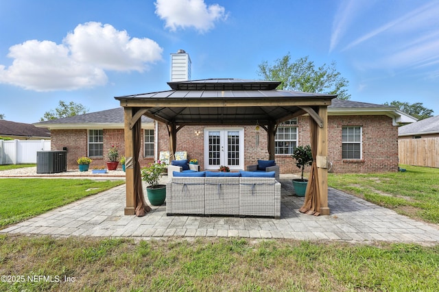 3172 Twilight Ct, Middleburg, FL 32068 - rear view of house featuring a gazebo, brick siding, outdoor lounge area, french doors, and a chimney