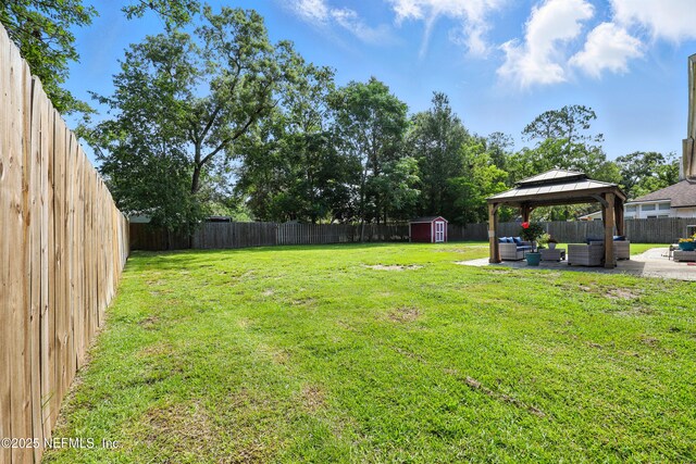 3172 Twilight Ct, Middleburg, FL 32068 - fenced backyard featuring outdoor lounge area, a shed, a patio, and a gazebo