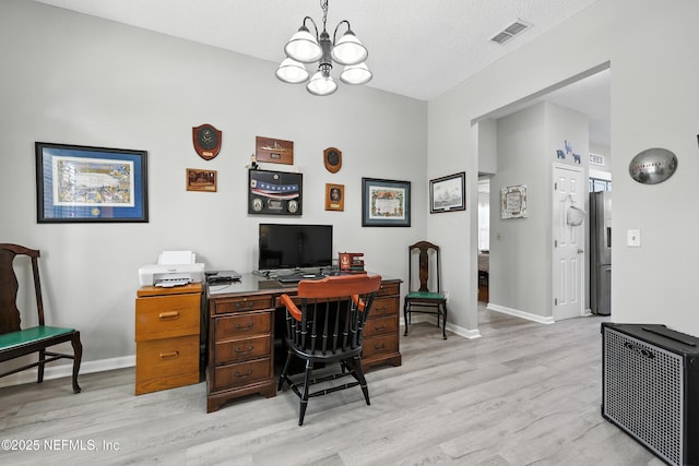 3172 Twilight Ct, Middleburg, FL 32068 - office space featuring light wood-style flooring and a chandelier