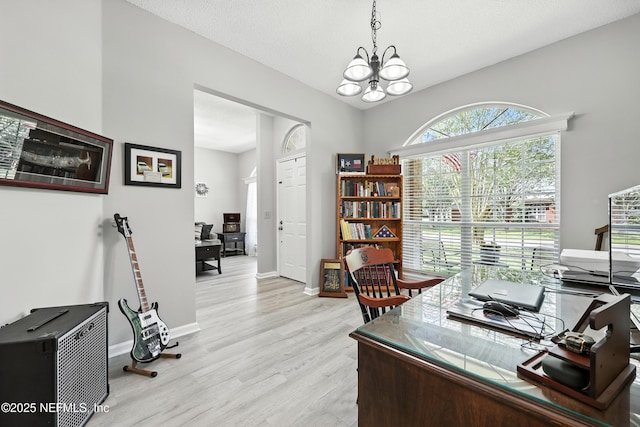 3172 Twilight Ct, Middleburg, FL 32068 - office area featuring light wood-style floors and a chandelier