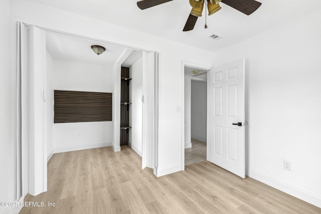 1901 Forest Hills Rd, Jacksonville, FL 32208 - unfurnished bedroom featuring light wood-style flooring, ceiling fan, and a closet