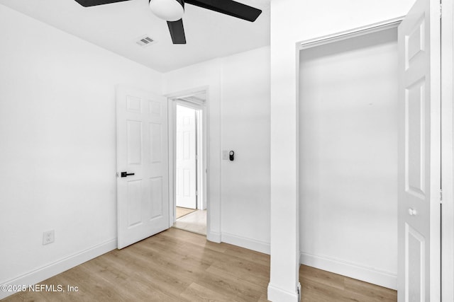 1901 Forest Hills Rd, Jacksonville, FL 32208 - unfurnished bedroom with light wood-type flooring and a ceiling fan