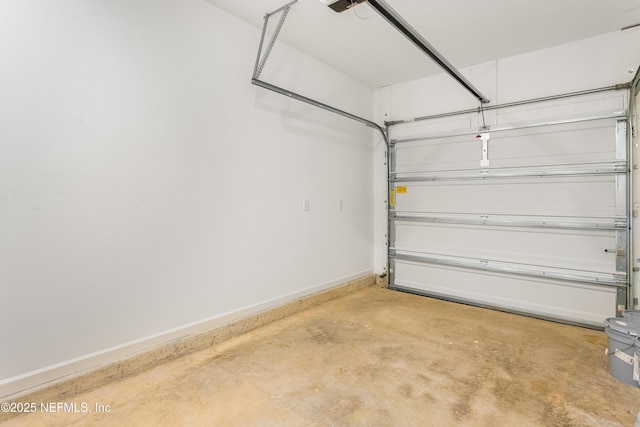 589 Holly Lakes Dr, Orange Park, FL 32073 - garage featuring baseboards