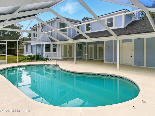 6615 Camelot Ct, Keystone Heights, FL 32656 - swimming pool with french doors, a patio, and a lanai