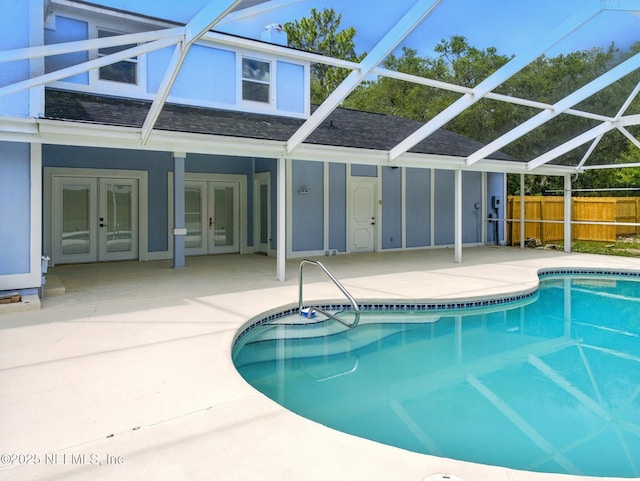 6615 Camelot Ct, Keystone Heights, FL 32656 - swimming pool featuring french doors, a patio, and glass enclosure