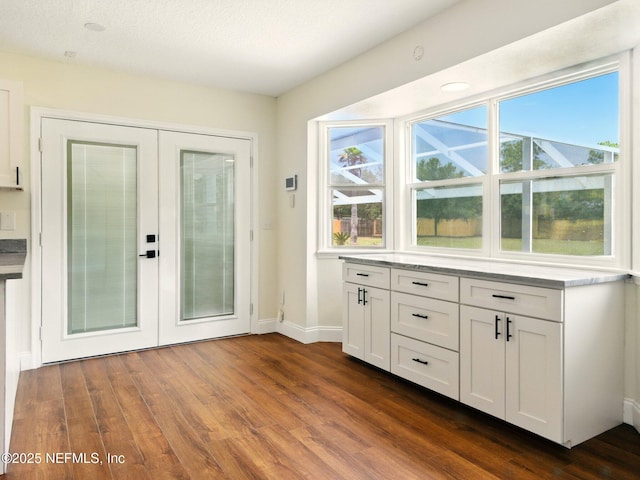6615 Camelot Ct, Keystone Heights, FL 32656 - entryway featuring french doors and dark wood finished floors