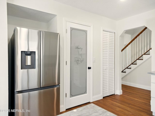 6615 Camelot Ct, Keystone Heights, FL 32656 - kitchen with stainless steel fridge and wood finished floors