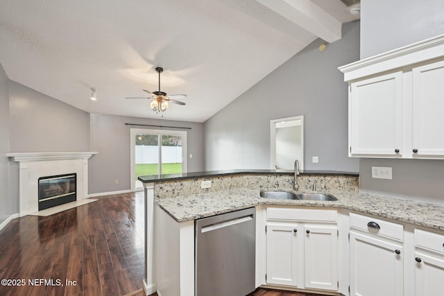12551 Hunters Branch Way, Jacksonville, FL 32224 - kitchen with stainless steel dishwasher, a peninsula, open floor plan, ceiling fan, and white cabinetry