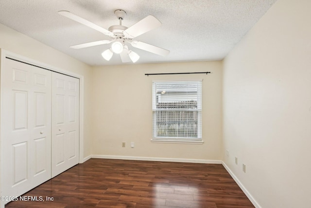 12551 Hunters Branch Way, Jacksonville, FL 32224 - unfurnished bedroom featuring wood finished floors, a textured ceiling, a closet, and a ceiling fan