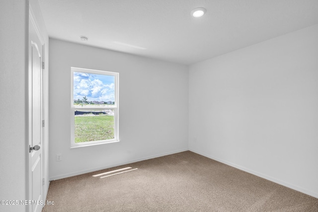 37119 Whippoorwill Ct, Hilliard, FL 32046 - spare room with carpet floors and recessed lighting
