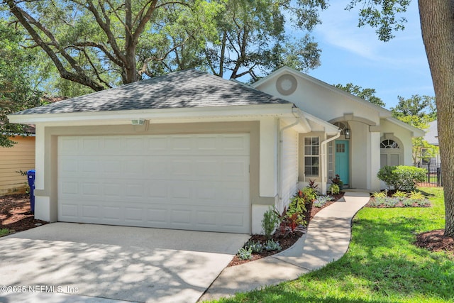 732 Putters Green Way, Saint Johns, FL 32259 - view of front of property with a garage, stucco siding, a shingled roof, and driveway