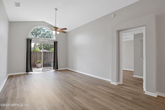 732 Putters Green Way, Saint Johns, FL 32259 - empty room featuring ceiling fan, wood finished floors, and high vaulted ceiling