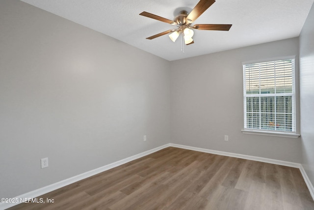 732 Putters Green Way, Saint Johns, FL 32259 - empty room with wood finished floors and ceiling fan