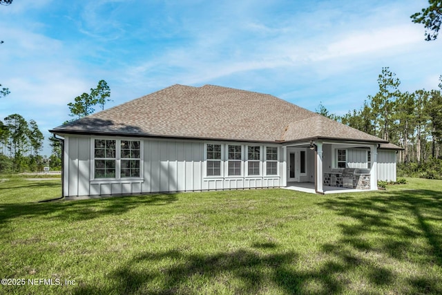 36295 Pitch Ln, Hilliard, FL 32046 - rear view of property with a patio area, board and batten siding, a lawn, and roof with shingles
