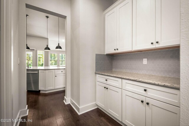36295 Pitch Ln, Hilliard, FL 32046 - kitchen featuring dishwasher, dark wood-style floors, decorative backsplash, and white cabinetry
