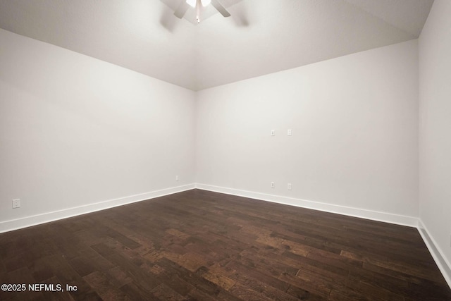 36295 Pitch Ln, Hilliard, FL 32046 - spare room featuring lofted ceiling, a ceiling fan, and dark wood-style floors