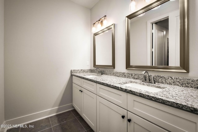 36295 Pitch Ln, Hilliard, FL 32046 - bathroom featuring double vanity and tile patterned floors