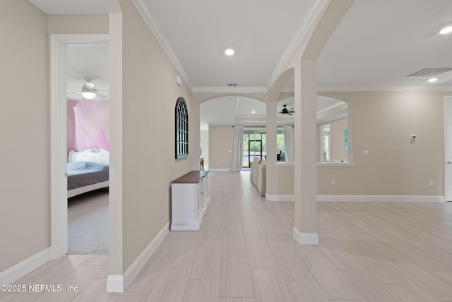 37 Tobago Ln, Saint Augustine, FL 32092 - hallway featuring arched walkways, ornamental molding, and recessed lighting