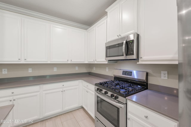 37 Tobago Ln, Saint Augustine, FL 32092 - kitchen featuring appliances with stainless steel finishes and white cabinets