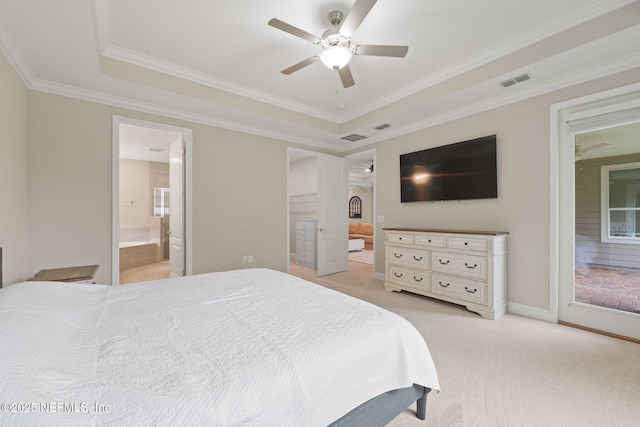 37 Tobago Ln, Saint Augustine, FL 32092 - bedroom with connected bathroom, crown molding, access to exterior, light carpet, and a tray ceiling