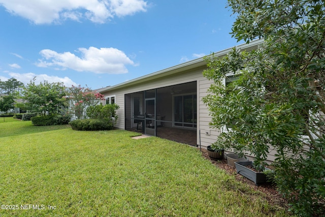37 Tobago Ln, Saint Augustine, FL 32092 - view of grassy yard featuring a sunroom