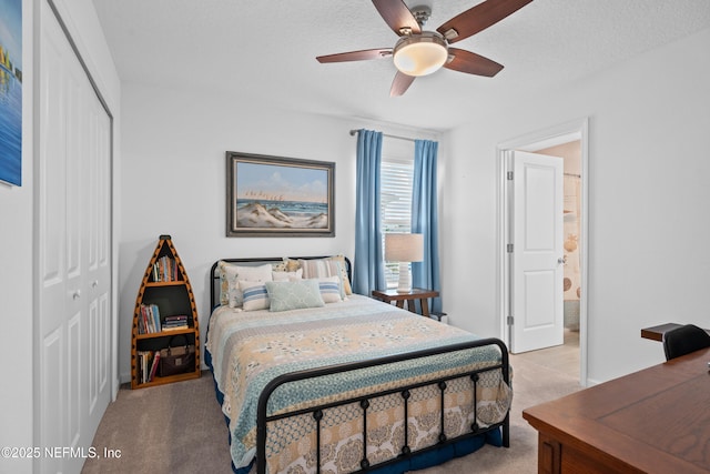 67 Carmella Ct, Saint Augustine, FL 32092 - bedroom with light carpet, a closet, ceiling fan, and connected bathroom