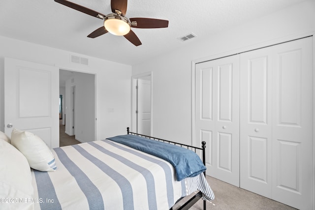 67 Carmella Ct, Saint Augustine, FL 32092 - bedroom featuring light carpet, a closet, and a ceiling fan