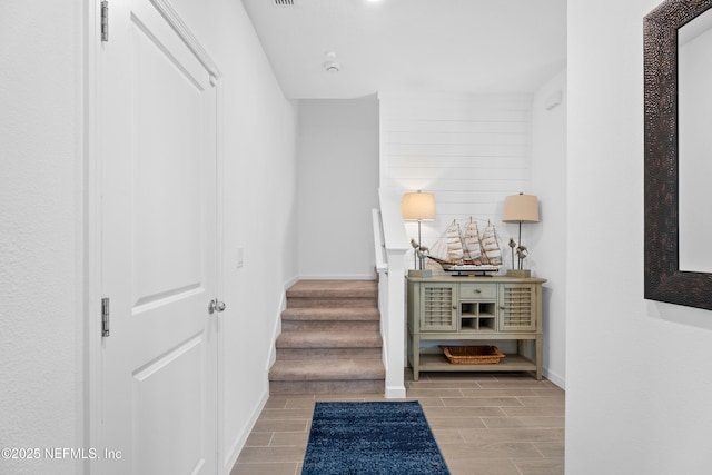 67 Carmella Ct, Saint Augustine, FL 32092 - hall featuring wood finish floors and stairs
