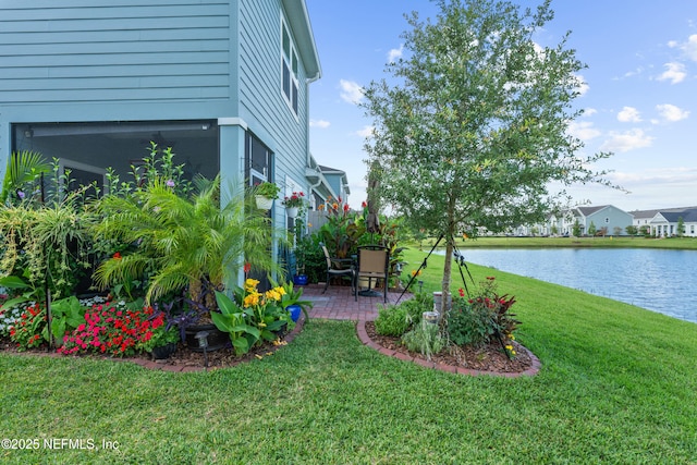 67 Carmella Ct, Saint Augustine, FL 32092 - view of grassy yard featuring a water view and a patio