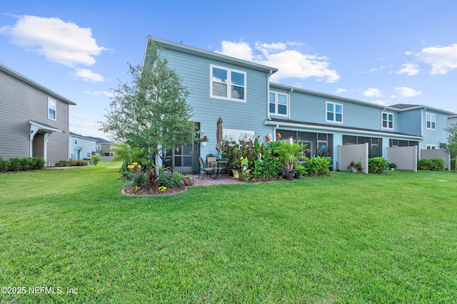 67 Carmella Ct, Saint Augustine, FL 32092 - back of property with a sunroom and a lawn