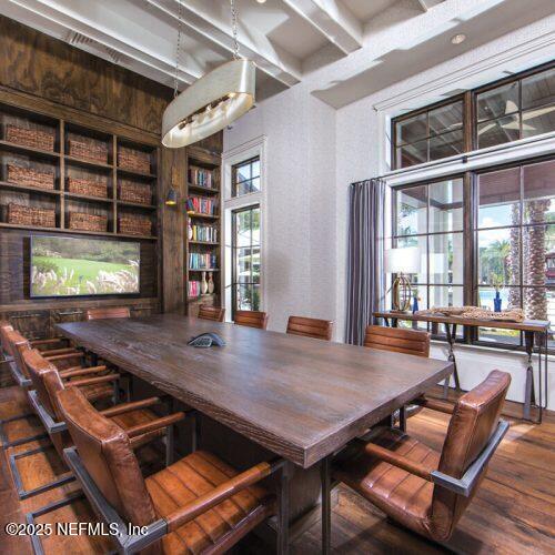 67 Carmella Ct, Saint Augustine, FL 32092 - dining area featuring hardwood / wood-style floors, beamed ceiling, and built in features