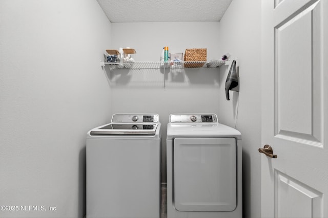 204 Bryson Dr, Fruit Cove, FL 32259 - laundry room with washer and dryer and a textured ceiling