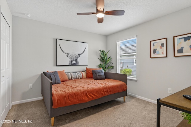 204 Bryson Dr, Fruit Cove, FL 32259 - bedroom with carpet, a textured ceiling, a ceiling fan, and a closet