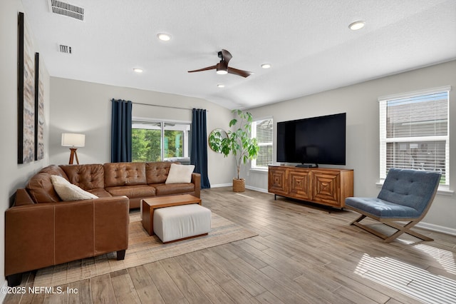 204 Bryson Dr, Fruit Cove, FL 32259 - living room with a ceiling fan, light wood-style floors, a textured ceiling, and recessed lighting