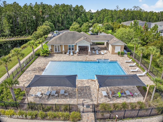 204 Bryson Dr, Fruit Cove, FL 32259 - community pool featuring french doors and a patio area