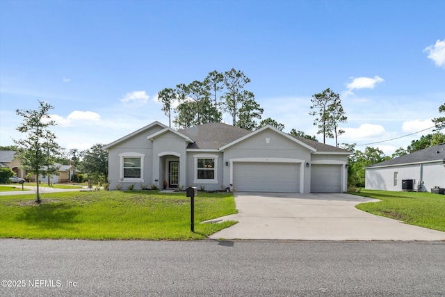 5 Bud Hollow Dr, Palm Coast, FL 32137 - single story home with an attached garage, concrete driveway, a front lawn, and stucco siding