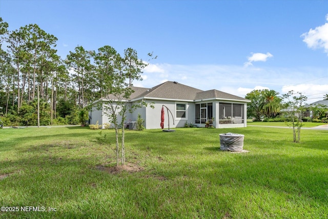 5 Bud Hollow Dr, Palm Coast, FL 32137 - view of front of home with a sunroom, a front lawn, stucco siding, and a shingled roof