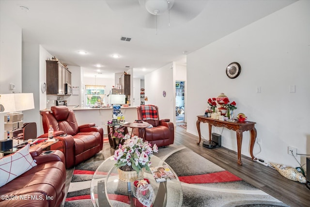 5 Bud Hollow Dr, Palm Coast, FL 32137 - living room with wood finished floors, ceiling fan, and recessed lighting