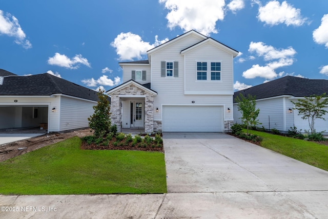 73 Ripple Rd, Saint Johns, FL 32095 - view of front facade featuring stone siding, an attached garage, driveway, and a front lawn