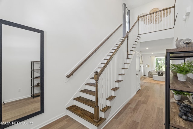 73 Ripple Rd, Saint Johns, FL 32095 - stairs with wood finished floors and a high ceiling