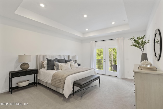 73 Ripple Rd, Saint Johns, FL 32095 - bedroom featuring a raised ceiling, light carpet, access to outside, recessed lighting, and french doors