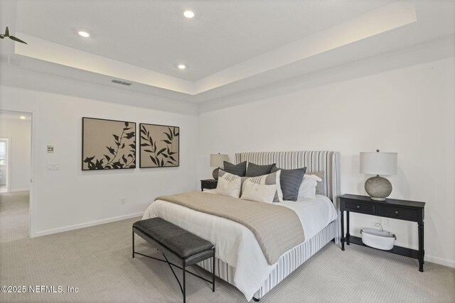 73 Ripple Rd, Saint Johns, FL 32095 - bedroom with light colored carpet, recessed lighting, and a raised ceiling